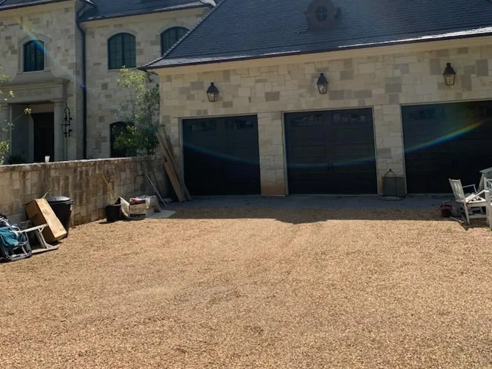 Three new doors on a stone house: a Golden Garage Door Services job